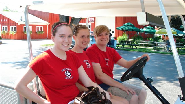 image staff in golf cart