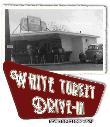 image White Turkey Drive-In Established 1932 black and white photo and retro sign.